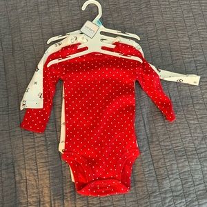 Never worn long sleeve onesies